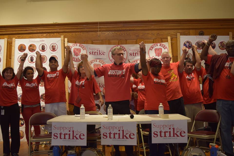 UNITE HERE Local 26 members presented photos of 600 Harvard Dining Services Workers who will strike (Photo from UNITE HERE Local 26 Facebook page)